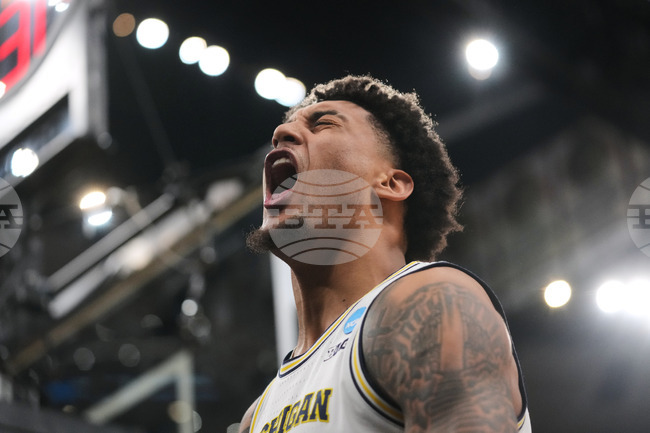 APTOPIX NCAA Tennessee Michigan Basketball