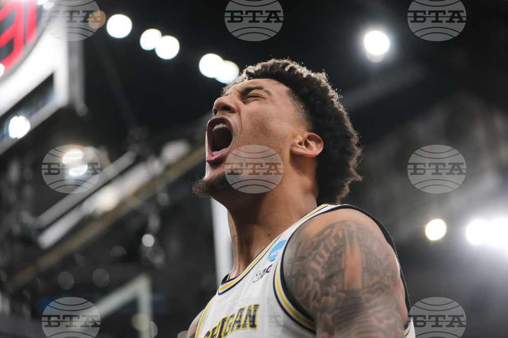 APTOPIX NCAA Tennessee Michigan Basketball