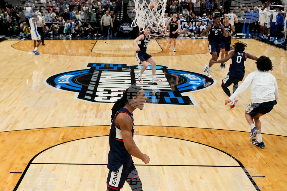 APTOPIX NCAA UConn Duke Basketball