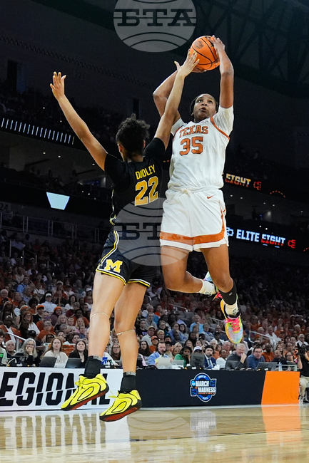 NCAA Michigan Texas Basketball