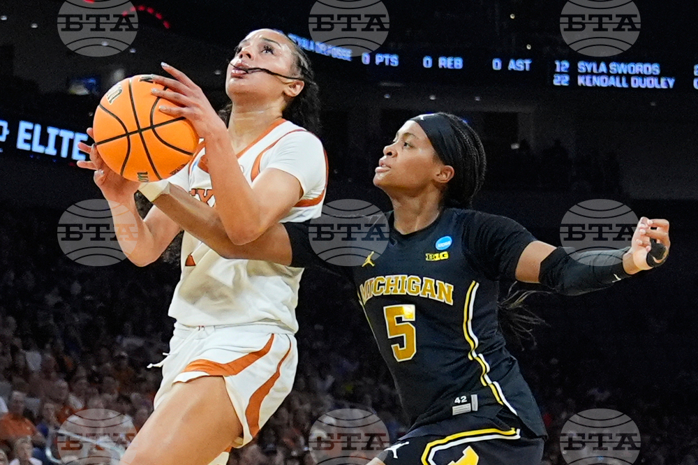 NCAA Michigan Texas Basketball