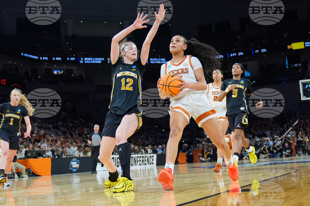 NCAA Michigan Texas Basketball
