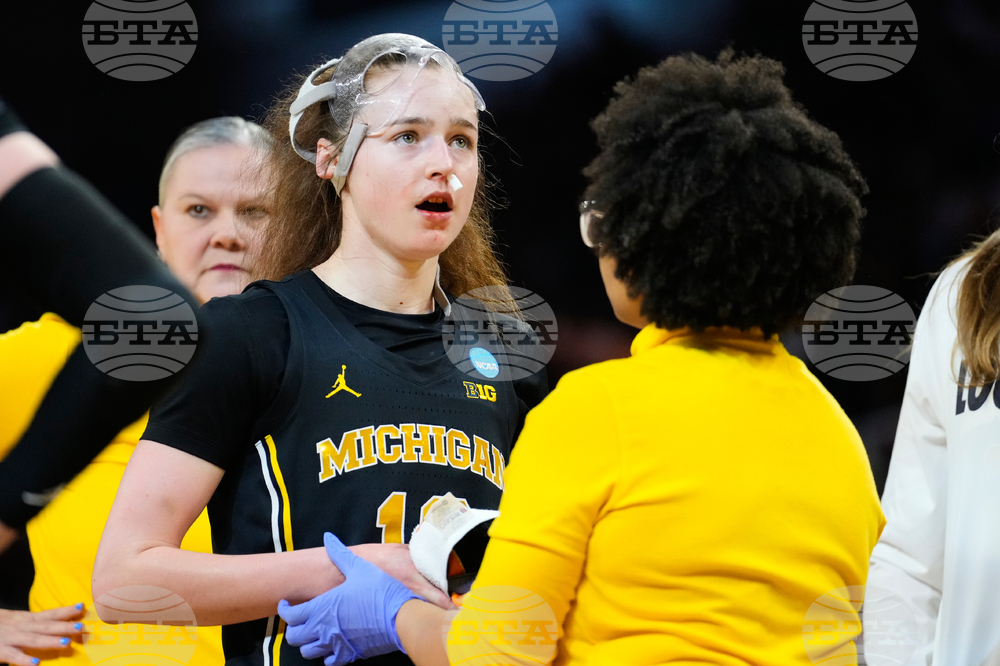 NCAA Michigan Texas Basketball