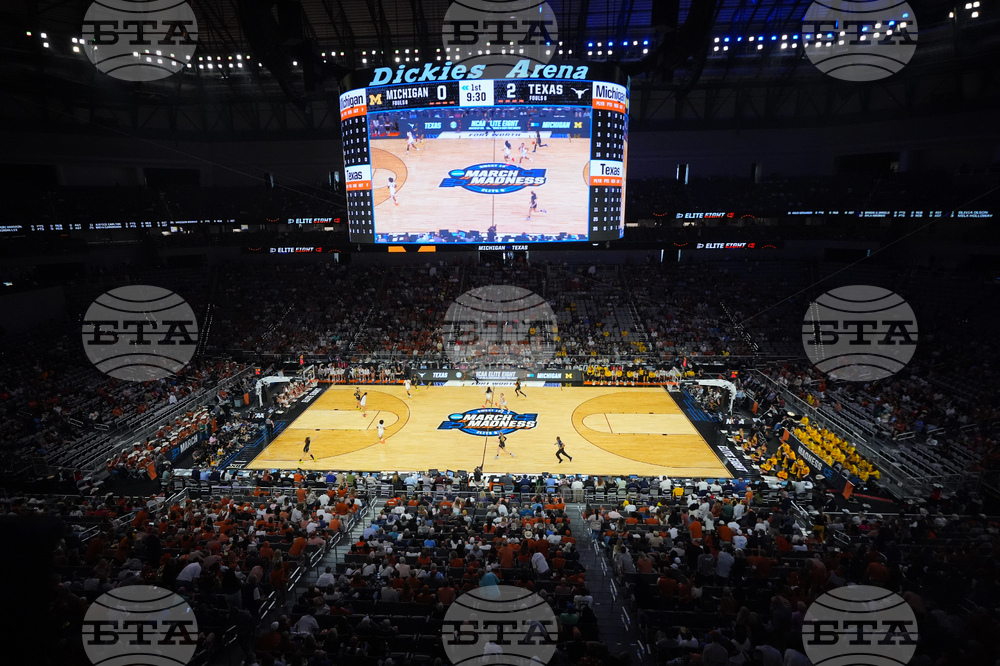 NCAA Michigan Texas Basketball