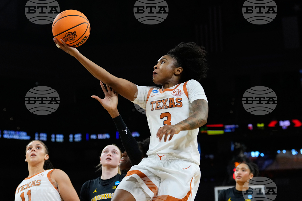 NCAA Michigan Texas Basketball