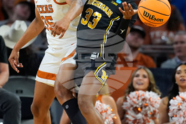 NCAA Michigan Texas Basketball