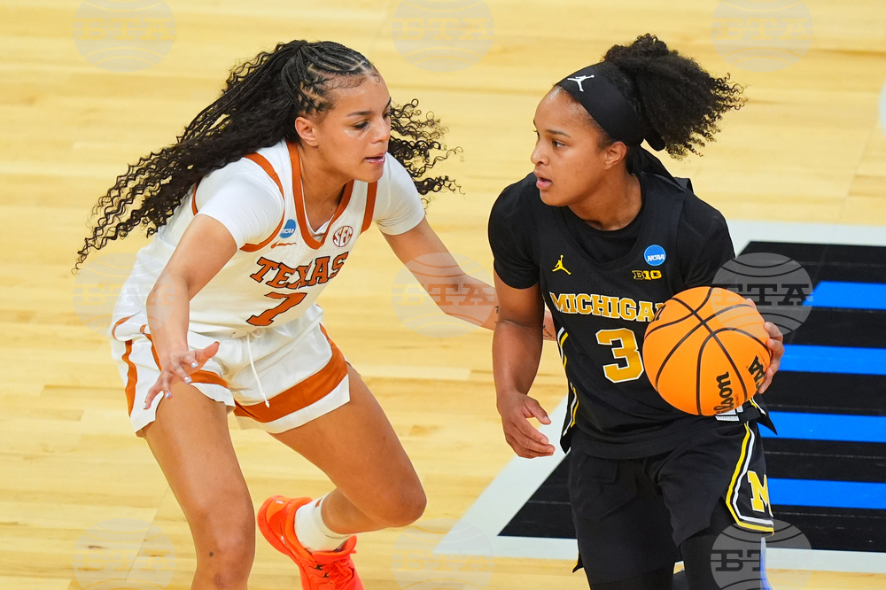 NCAA Michigan Texas Basketball