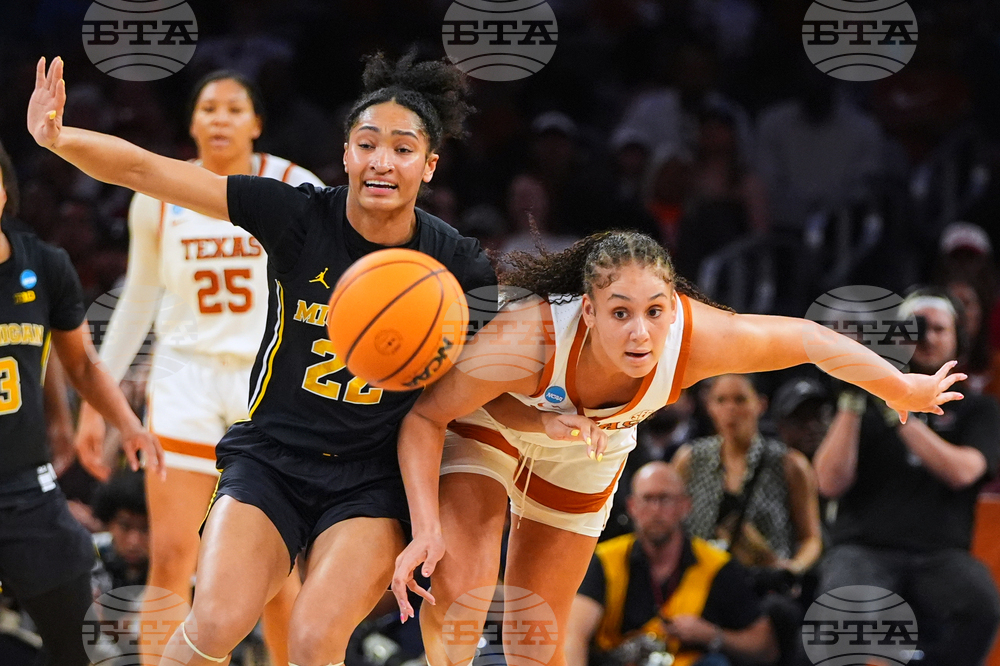NCAA Michigan Texas Basketball