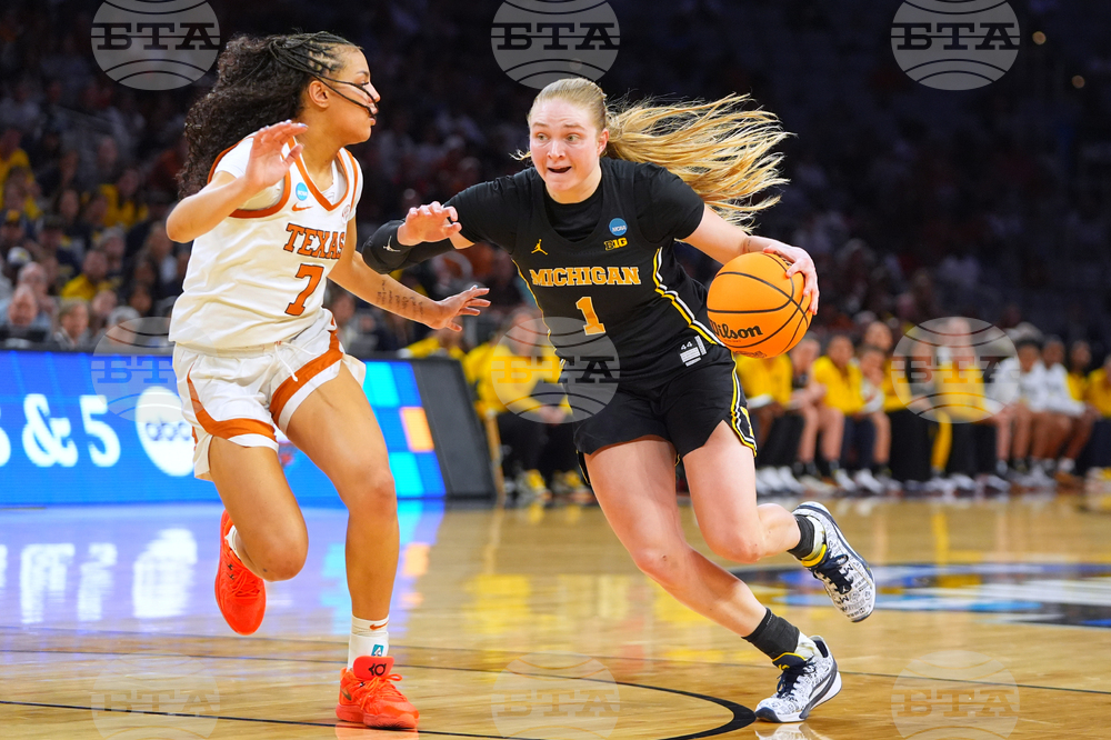 NCAA Michigan Texas Basketball