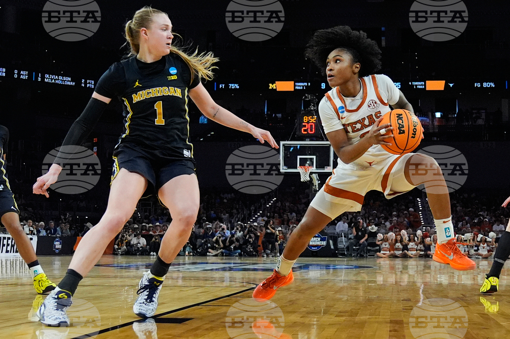 NCAA Michigan Texas Basketball