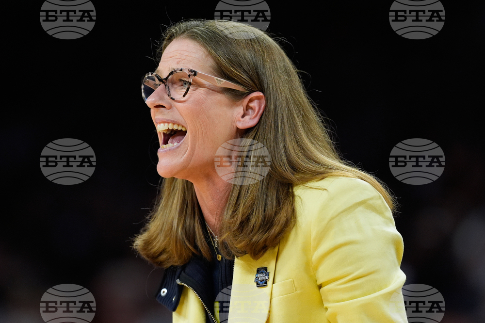 NCAA Michigan Texas Basketball