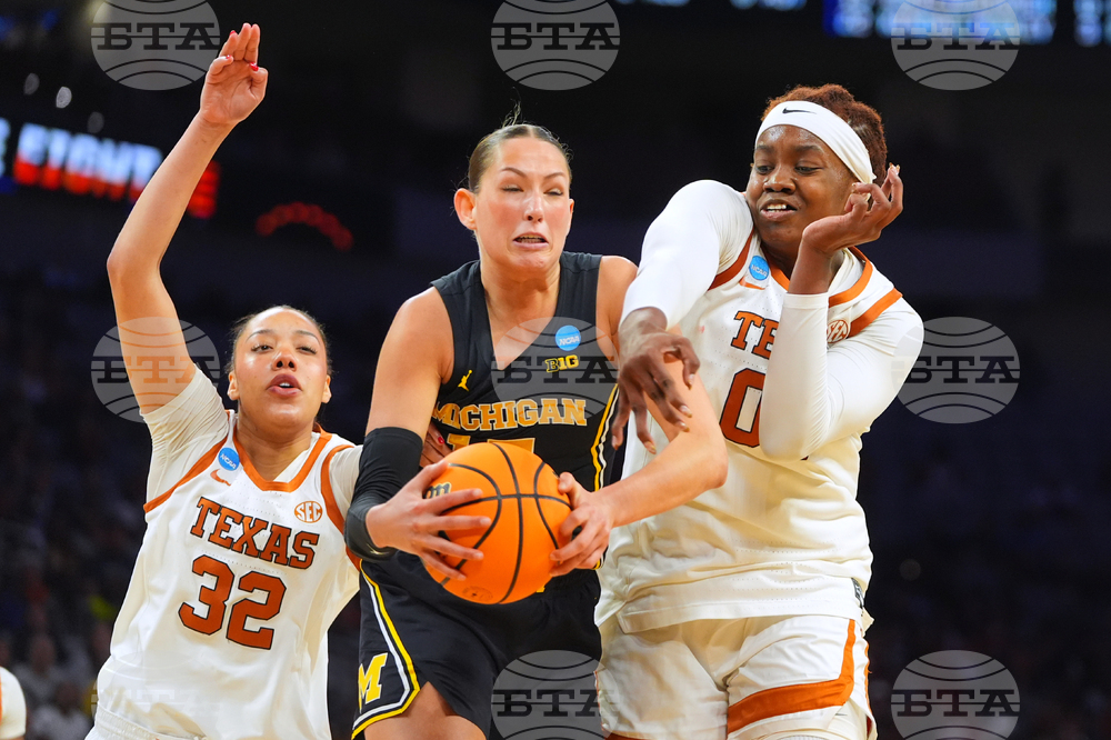 NCAA Michigan Texas Basketball