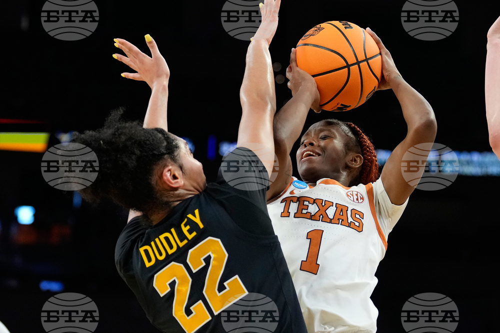 NCAA Michigan Texas Basketball