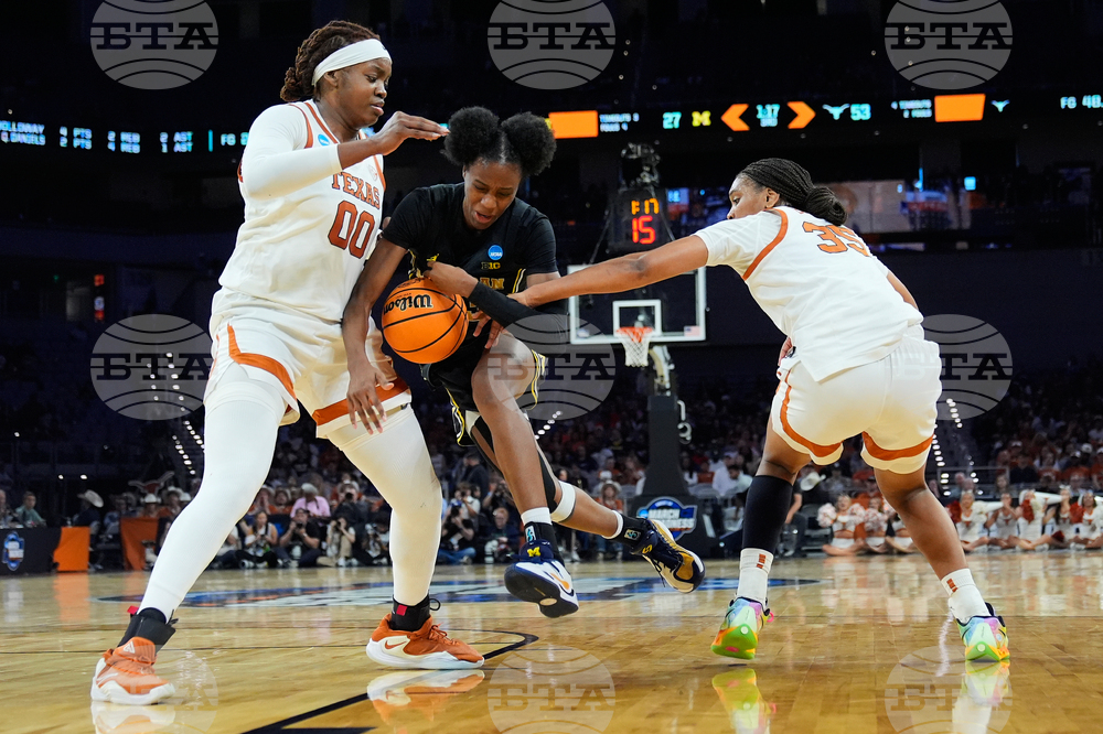 NCAA Michigan Texas Basketball