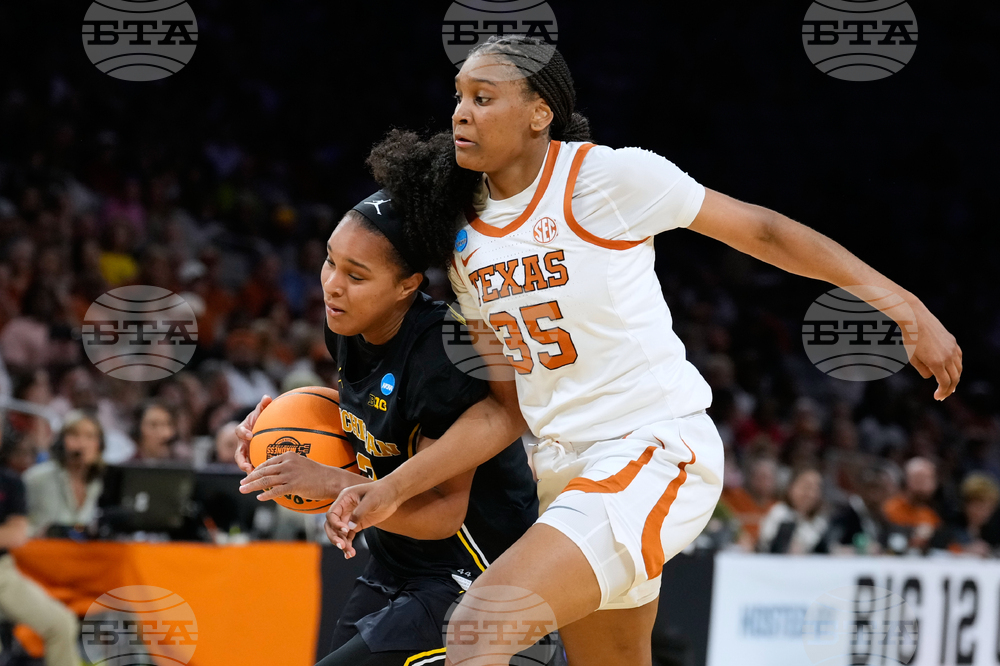 NCAA Michigan Texas Basketball