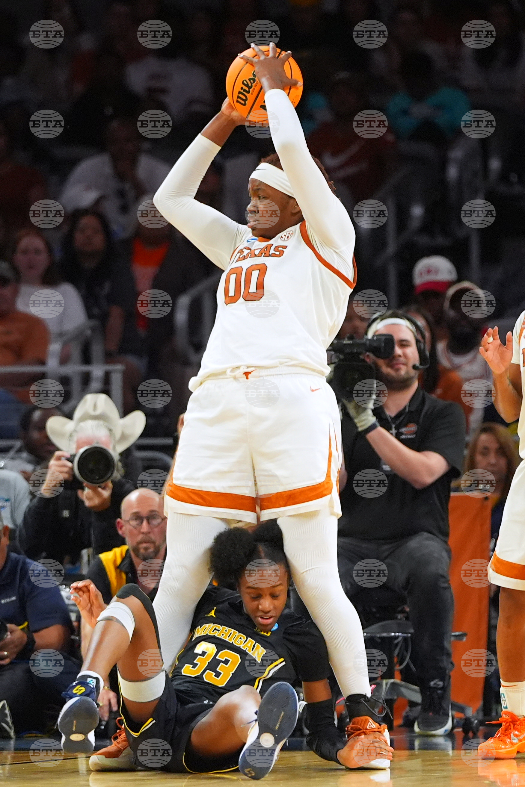 NCAA Michigan Texas Basketball