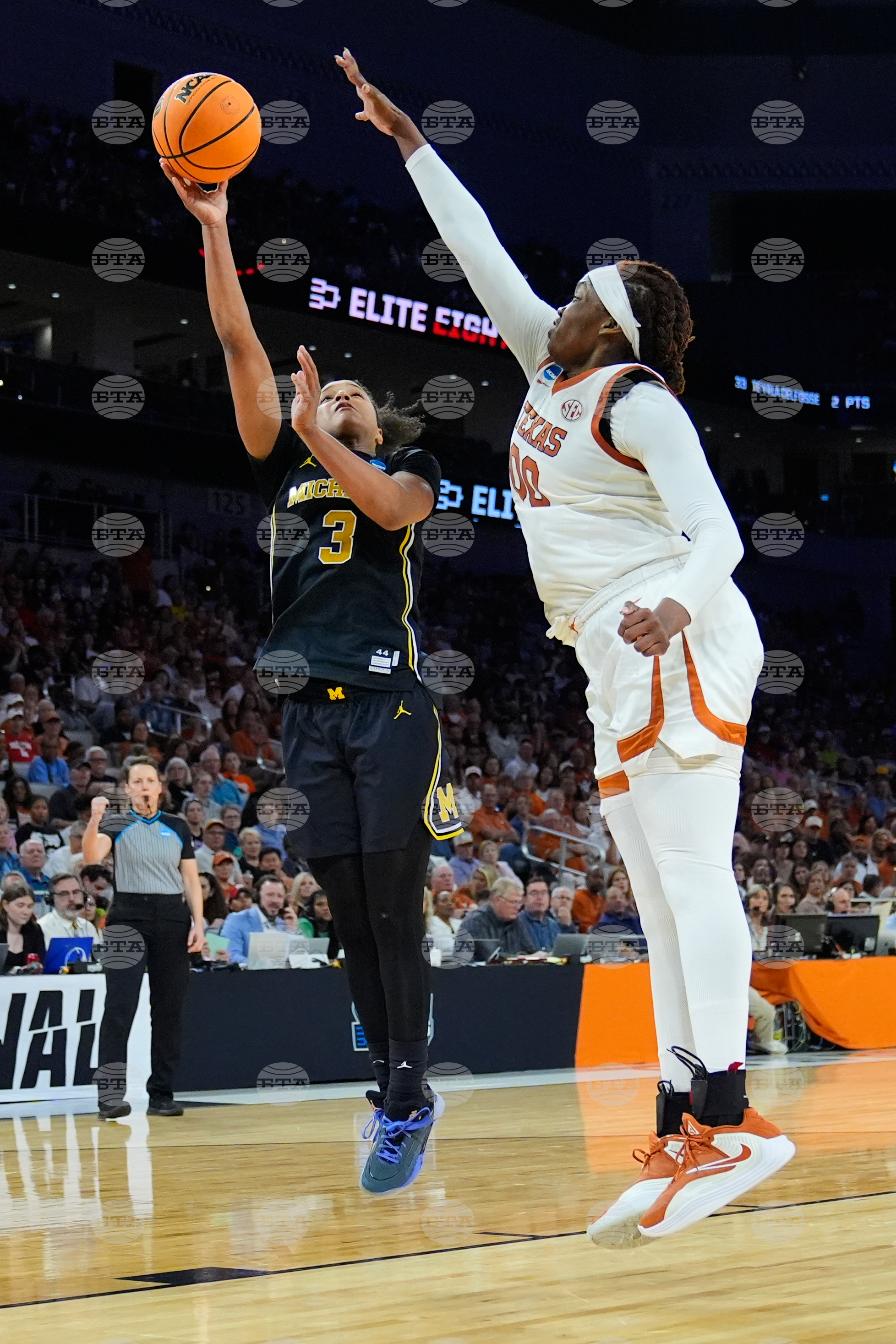 NCAA Michigan Texas Basketball