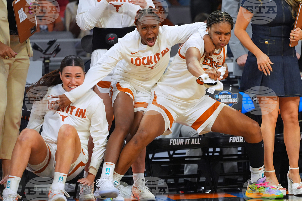 NCAA Michigan Texas Basketball