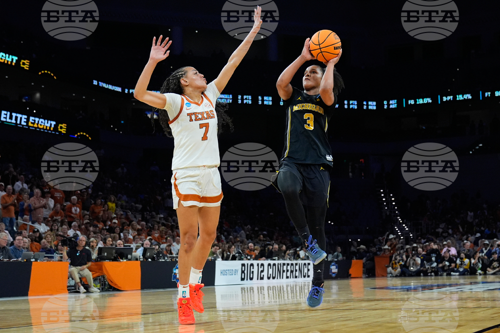 NCAA Michigan Texas Basketball