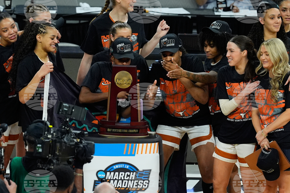 NCAA Michigan Texas Basketball