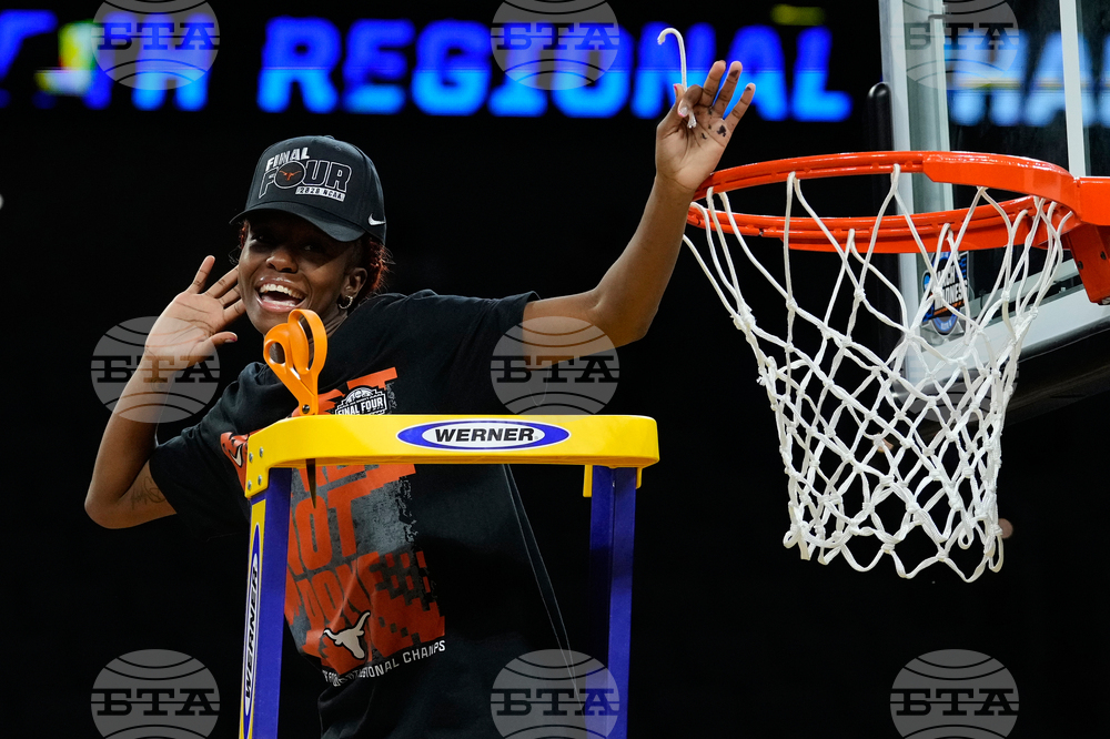 NCAA Michigan Texas Basketball