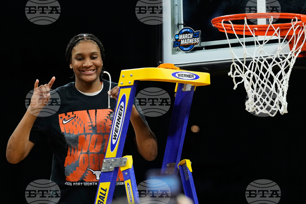 NCAA Michigan Texas Basketball