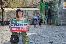 Румъния - акция в Букурещ под надслов „Протест срещу войната - казваме „не“ на съучастието на Румъния в империалистическата война, започната от САЩ и Израел“