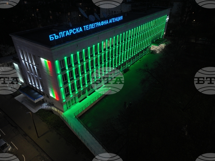 BTA Building's Facade Lit in Green for Palm Sunday