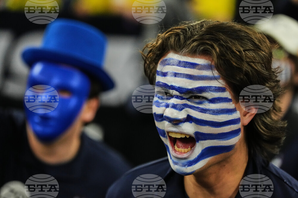 NCAA UConn Michigan Basketball