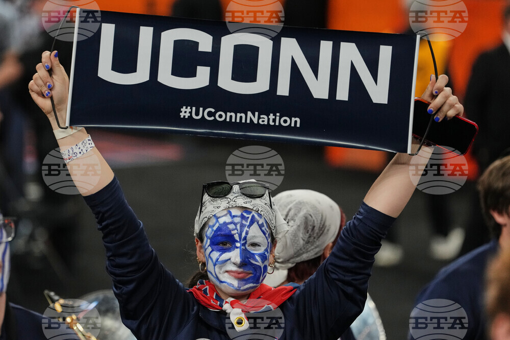NCAA UConn Michigan Basketball