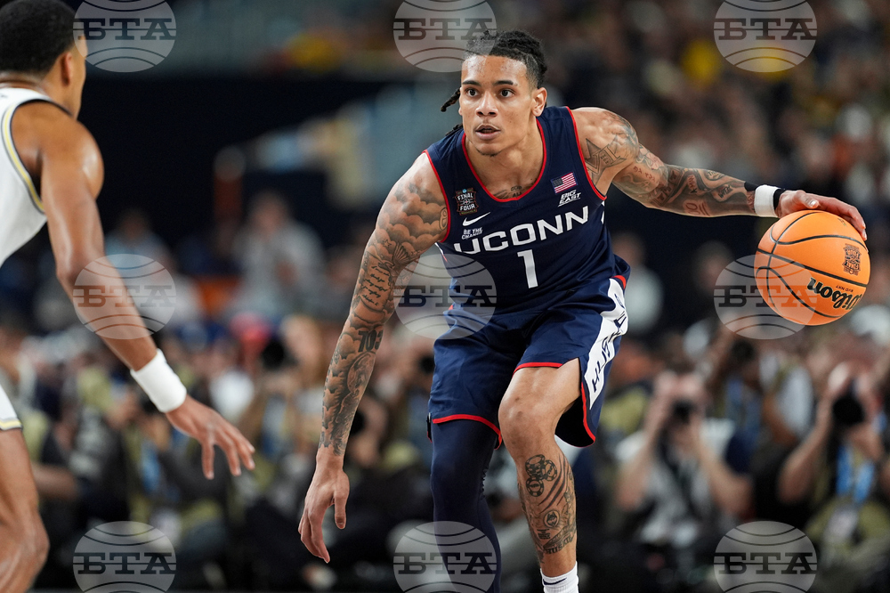 NCAA UConn Michigan Basketball