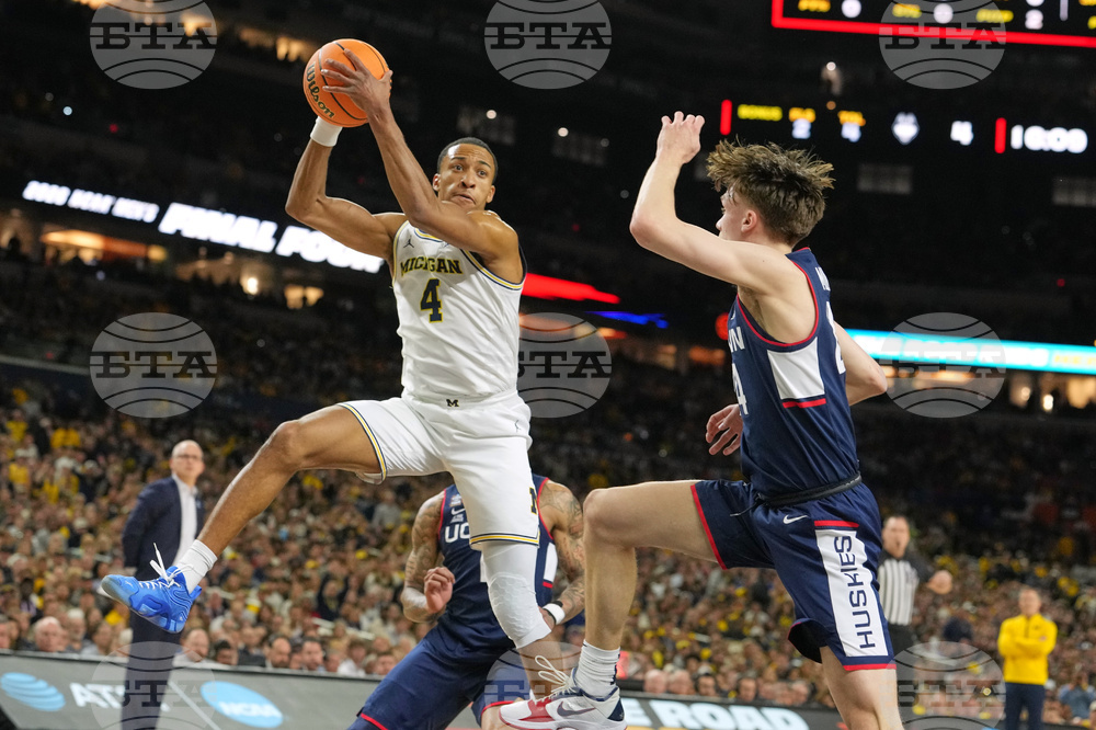 NCAA UConn Michigan Basketball