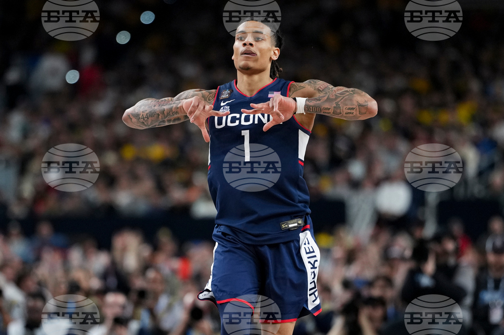 NCAA UConn Michigan Basketball