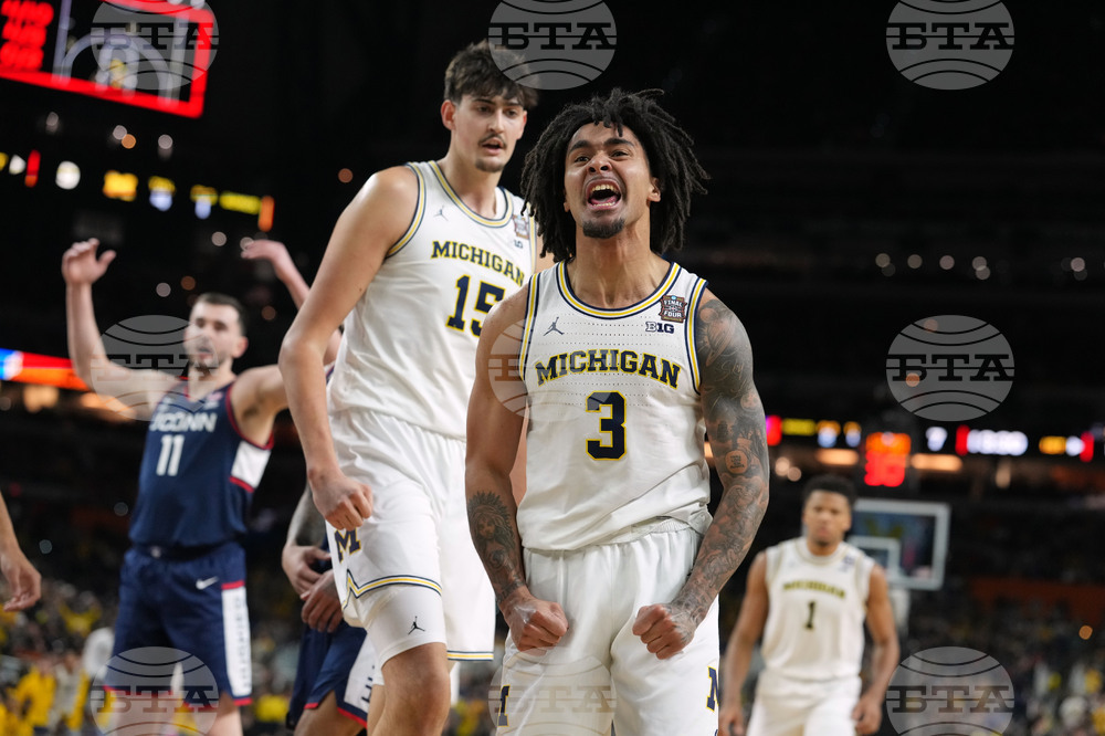 NCAA UConn Michigan Basketball