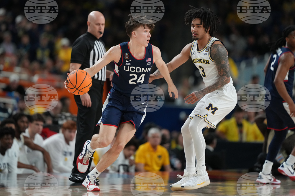 NCAA UConn Michigan Basketball