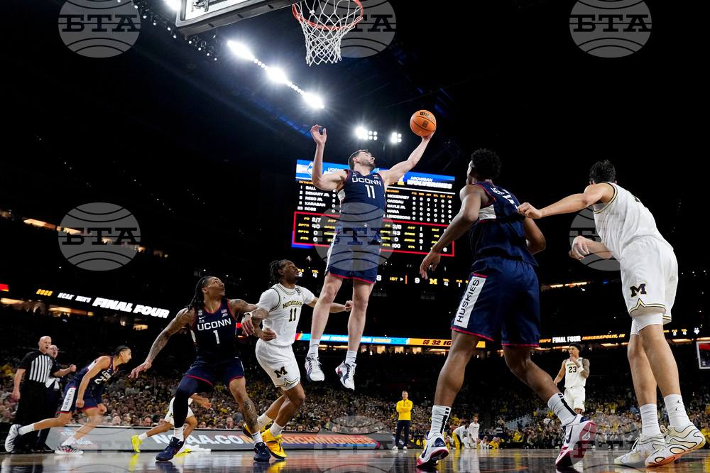 NCAA UConn Michigan Basketball