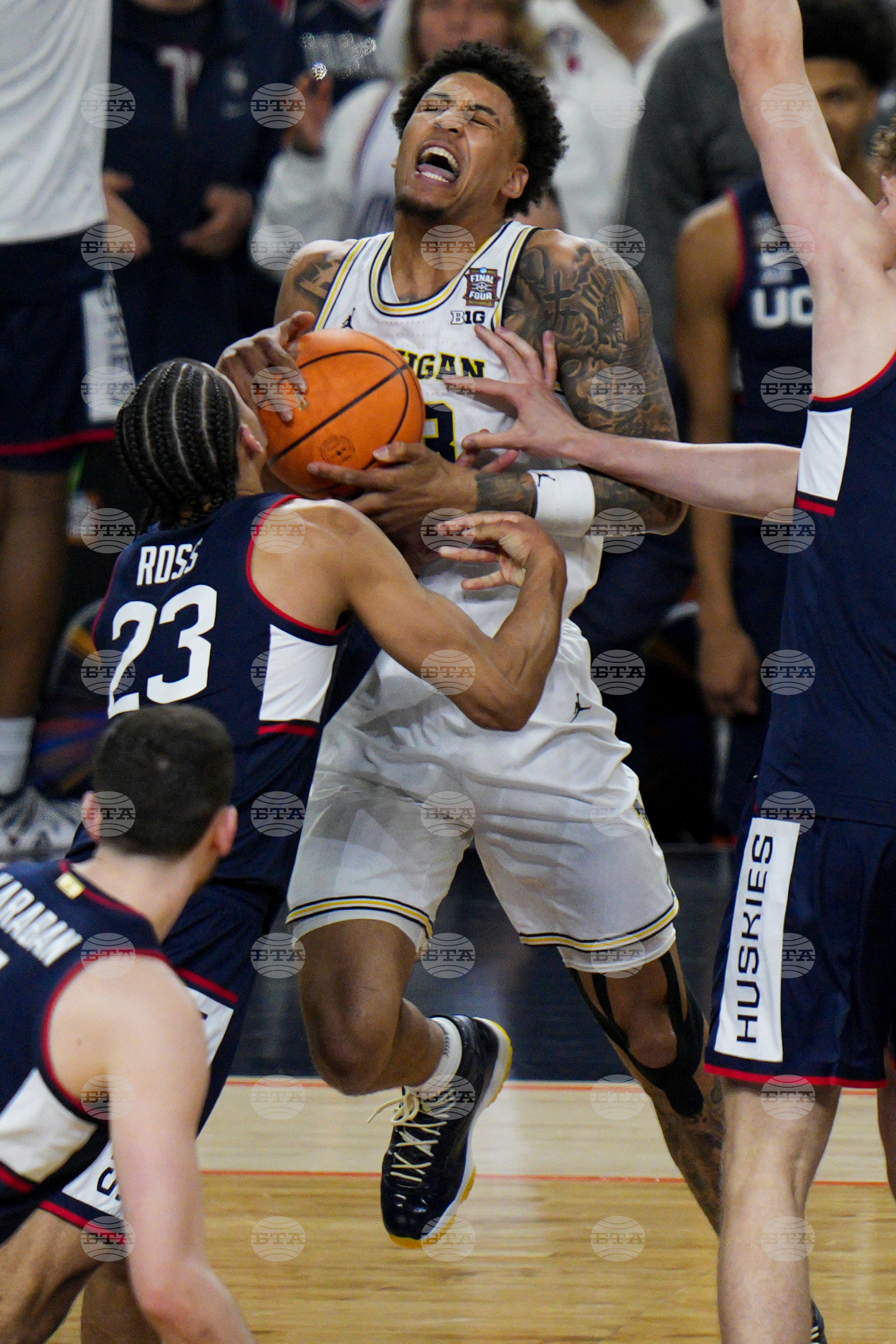 NCAA UConn Michigan Basketball