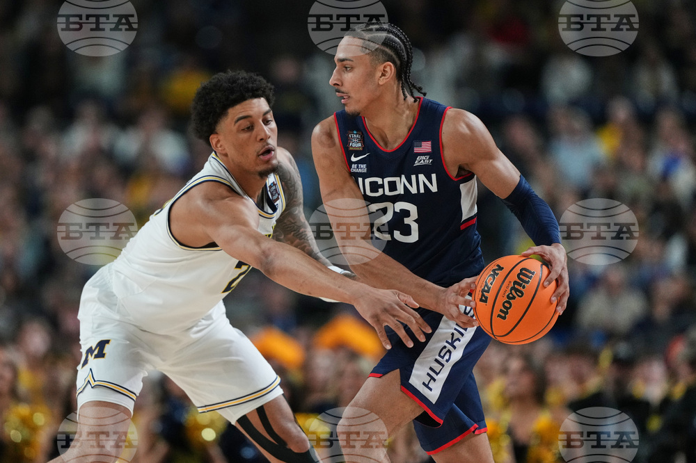 NCAA UConn Michigan Basketball