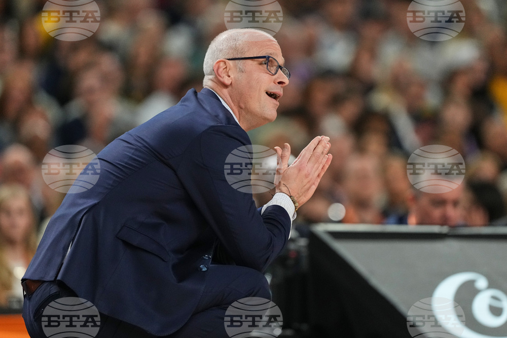 NCAA UConn Michigan Basketball