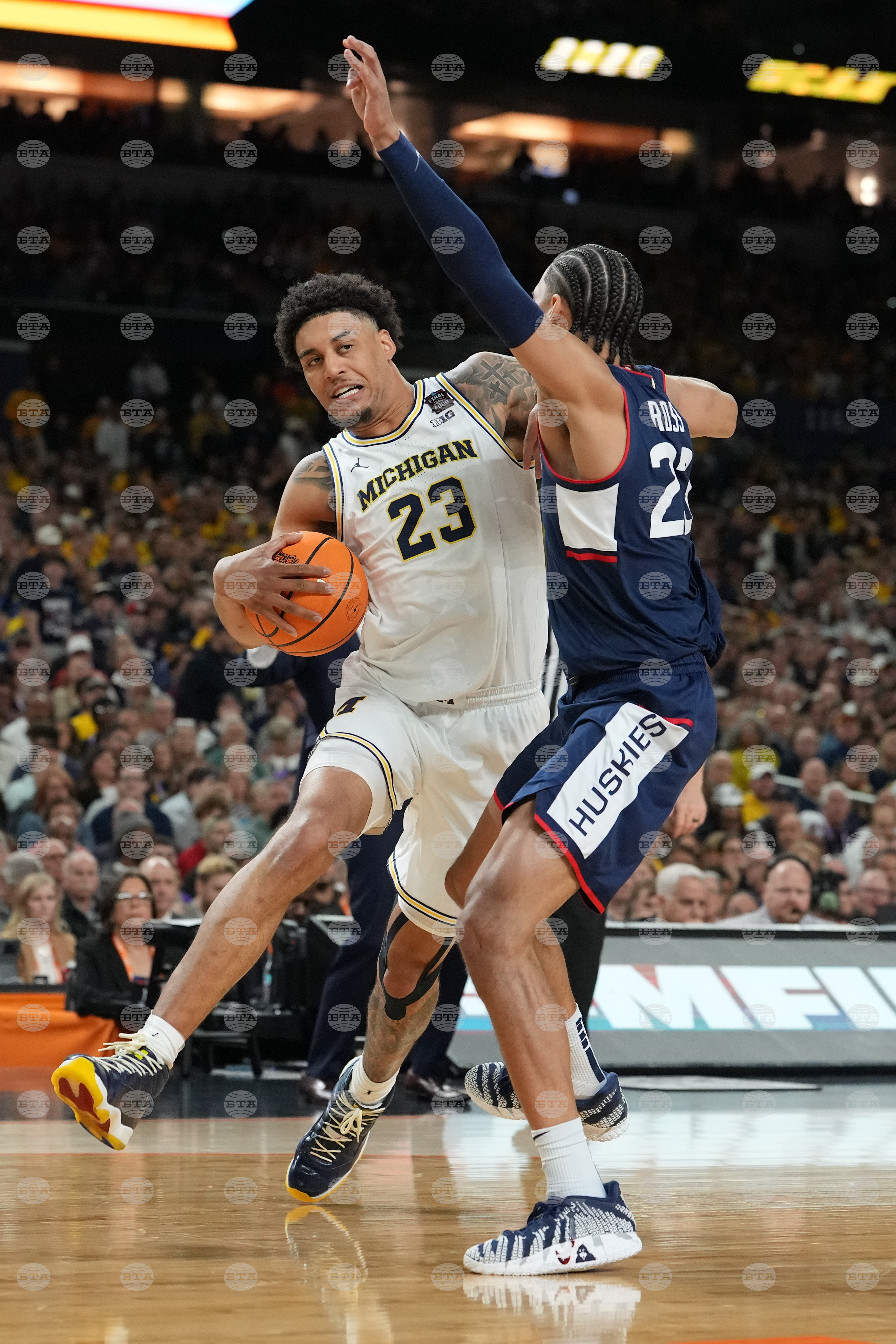 NCAA UConn Michigan Basketball