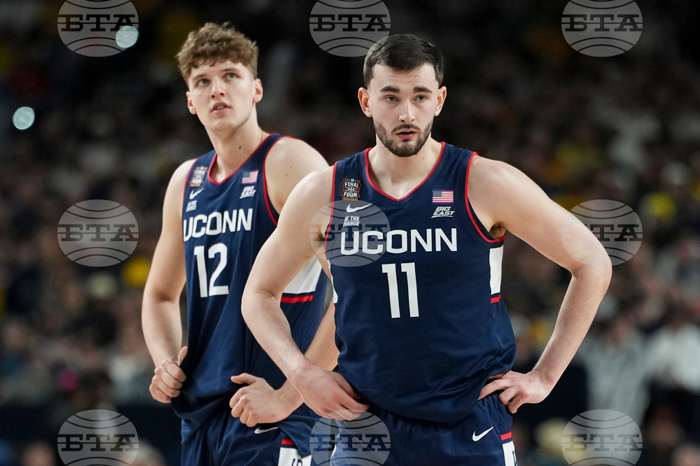 NCAA UConn Michigan Basketball