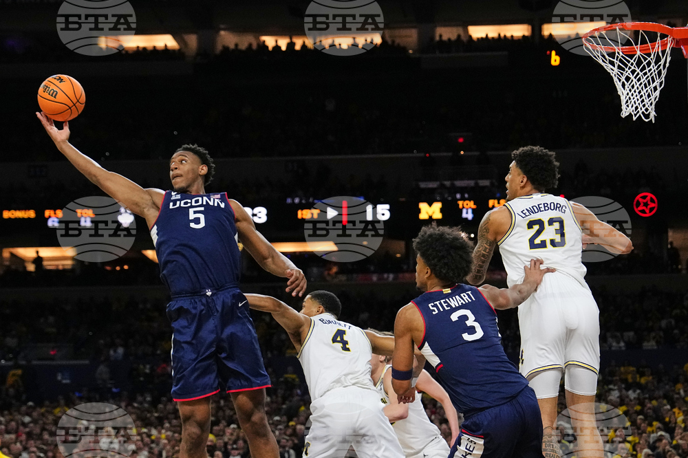 NCAA UConn Michigan Basketball