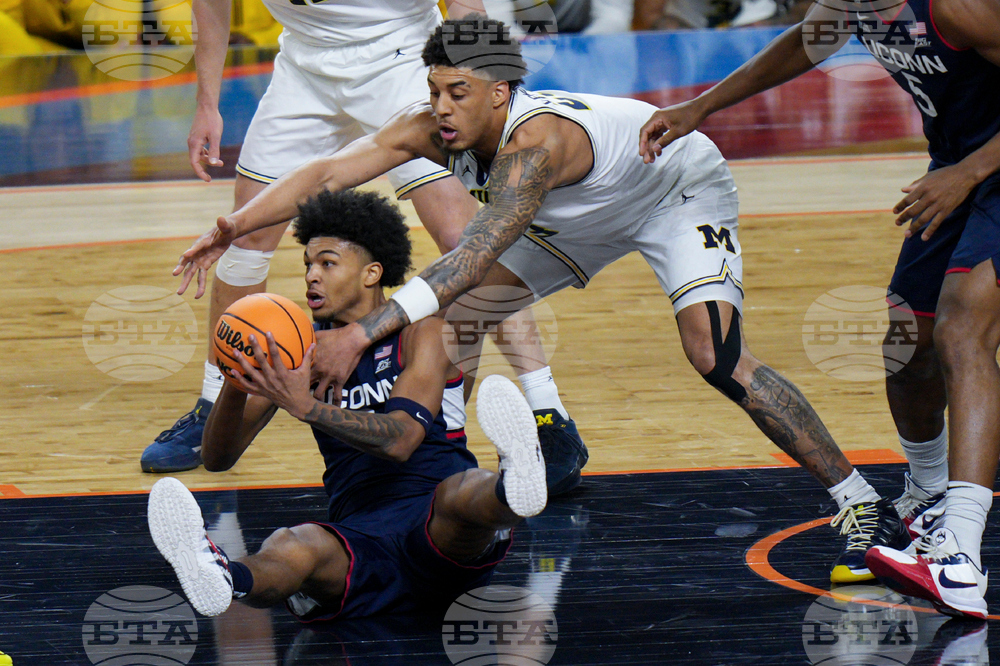 NCAA UConn Michigan Basketball