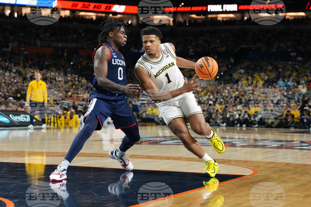 NCAA UConn Michigan Basketball