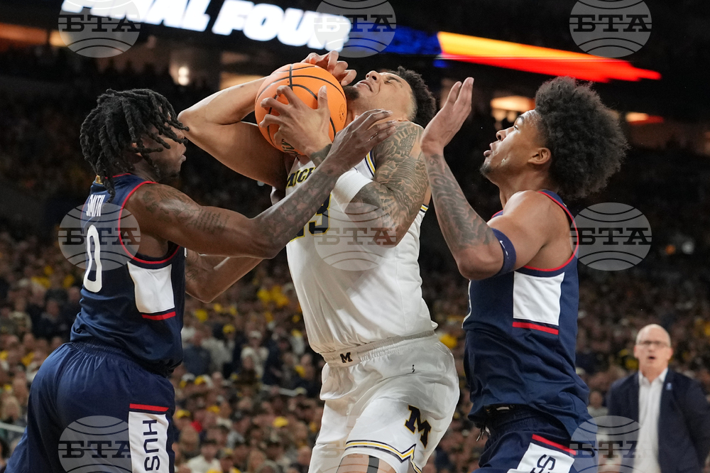 NCAA UConn Michigan Basketball