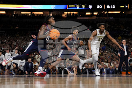 NCAA UConn Michigan Basketball