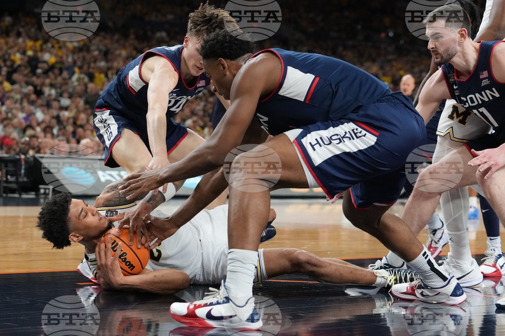 NCAA UConn Michigan Basketball