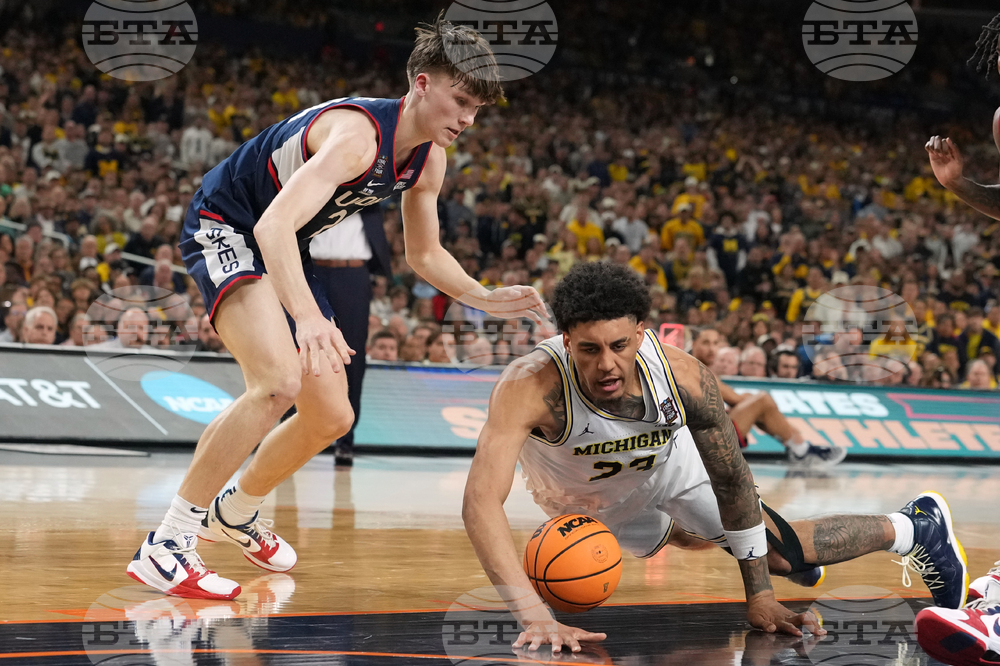 NCAA UConn Michigan Basketball