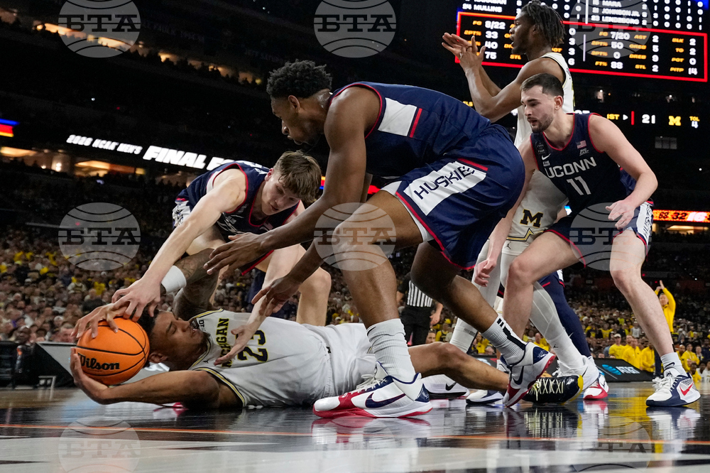 NCAA UConn Michigan Basketball