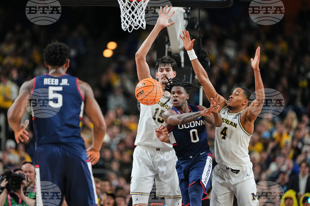 NCAA UConn Michigan Basketball